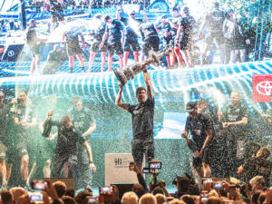 Peter Burling hoists the America’s Cup