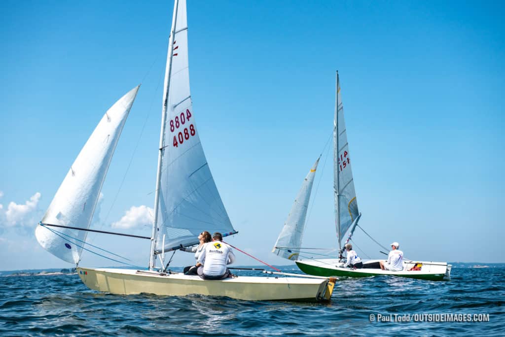 Kevin Buruchian (No. 4088) and Talbot Ingram work their Comets down the run at the Helly Hansen NOOD Regatta at Marblehead Race Week