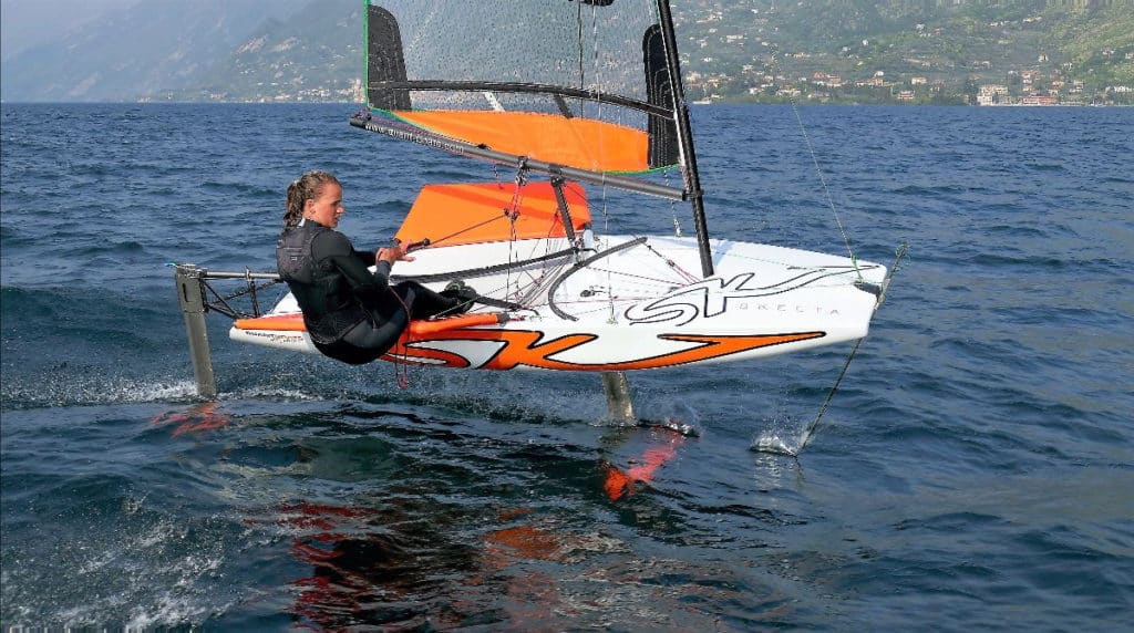 Female sailing a foiling dinghy